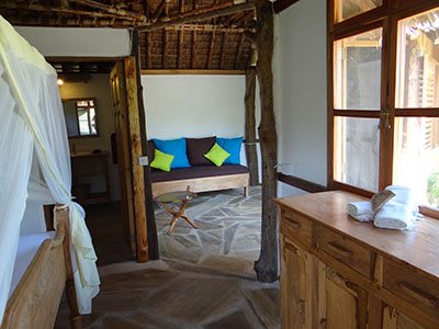 Bedroom, living room and bathroom are ideal for longer stays in the Beach Bungalows